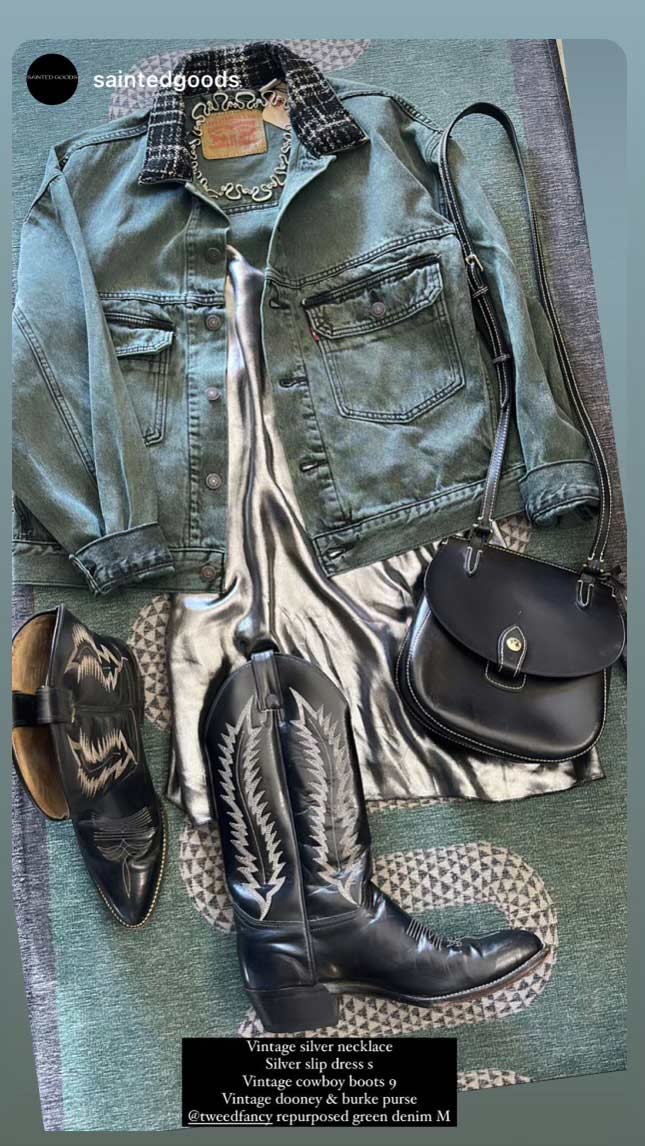 an outfit arranged with jacket, dress, cowboy boots, and purse